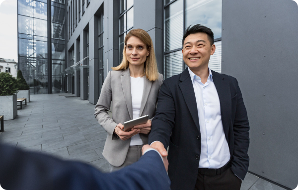 business meet three business colleagues greet eac 2025 03 26 07 31 13 utc