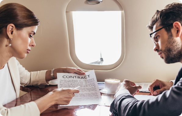 businessman and businesswoman looking at contract 2024 11 10 07 44 32 utc